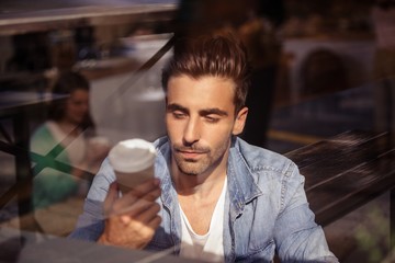 Attractive casual man drinking coffee 