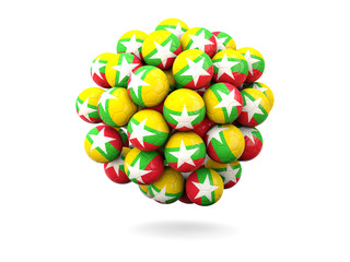 Pile of footballs with flag of myanmar