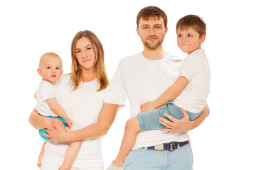 Portrait of young happy family with two children