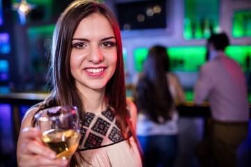 Beautiful woman holding a glass of wine