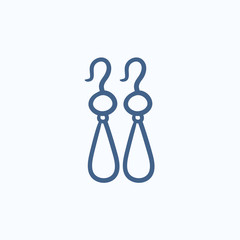 Pair of earrings sketch icon.