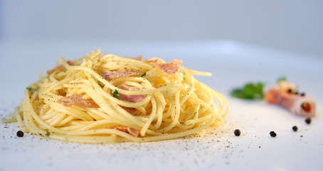BEAUTIFUL DELICIOUS GOURMET SPAGHETTI CARBONARA DISH , LANDSCAPE VIEW, SELECTIVE FOCUS