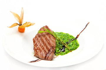 veal steak with spinach sauce