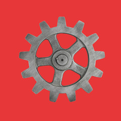 cog cogs on red background