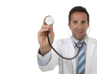 40s attractive male medicine doctor in medical gown with close up hand holding stethoscope smiling happy