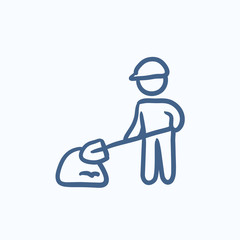 Man with shovel and hill of sand sketch icon.
