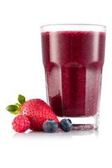 Smoothie in glass with strawberry, bilberry and raspberry
