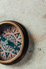 Compass on a gray gradient background