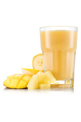 Yellow smoothie with mango, pineapple, banana and melon in glass