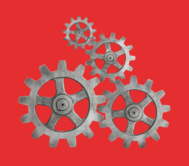 cog cogs on red background