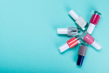 cosmetics on blue workplace. Top view