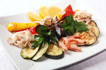 seafood with vegetables and lemon