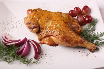 half chicken on platter