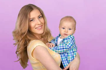 Happy young mother and her son