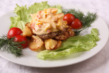 dish with roasted potatoes