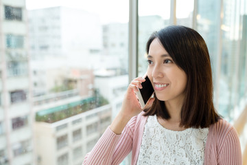 Fototapeta premium Woman talk to cellphone