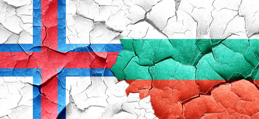 faroe islands flag with Bulgaria flag on a grunge cracked wall