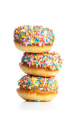 various donuts on white background