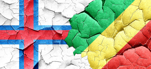 faroe islands flag with congo flag on a grunge cracked wall