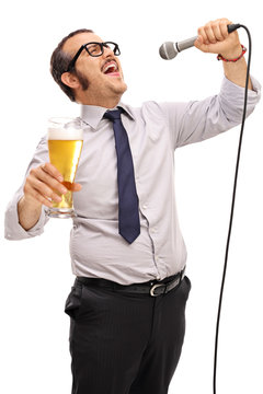 Dedicated man singing on a microphone