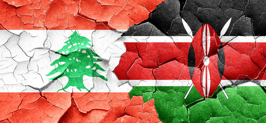 Lebanon flag with Kenya flag on a grunge cracked wall