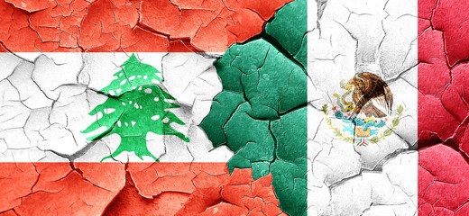 Lebanon flag with Mexico flag on a grunge cracked wall