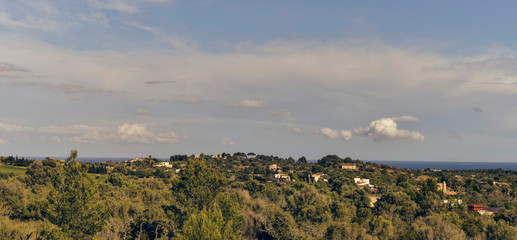 Houses on hill near coast. Mallorca. Spain.