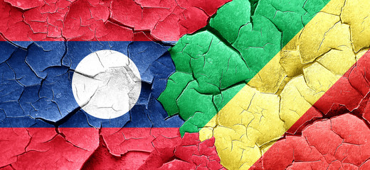 Laos flag with congo flag on a grunge cracked wall
