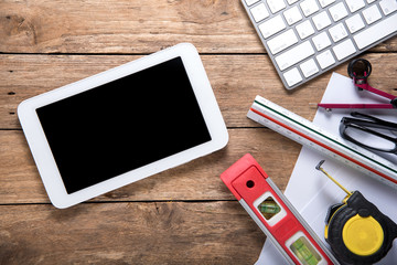 engineering objects on wooden table. top view