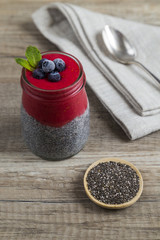 Fototapeta na wymiar Raspberry chia pudding with chia seeds