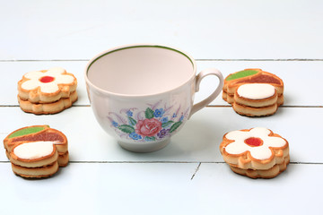 empty tea cup home made cookies autumn wooden background