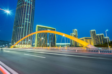 Obraz premium motion blurred car at bridge,tianjin city,china.