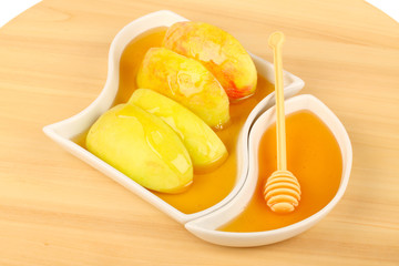 Dipping apples in honey