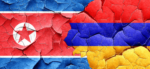 North Korea flag with Armenia flag on a grunge cracked wall