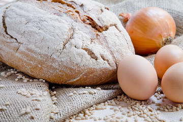 Wheat bread, eggs on sacking