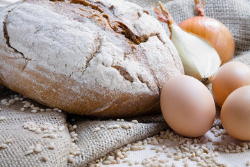 Wheat bread, eggs on sacking