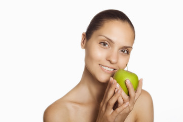 Girl with green apple in hands