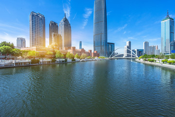 Obraz premium Modern buildings and river in urban city,tianjin china