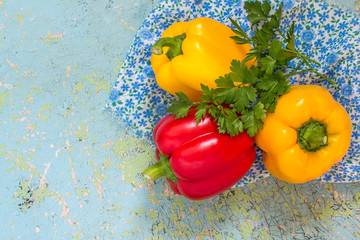 Red and yellow bell peppers and parsley