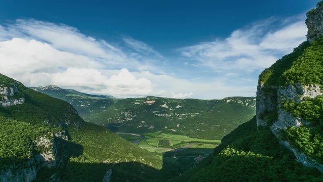 Mountains and Valley with Clouds
TimeLapse &ndash; Clouds passing over the Fields. It&rsquo;s useful for intro&rsquo;s, presentations, promoting products and so on.