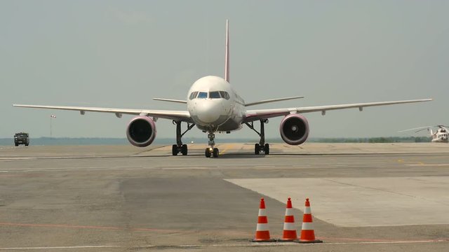 The plane was going down the runway