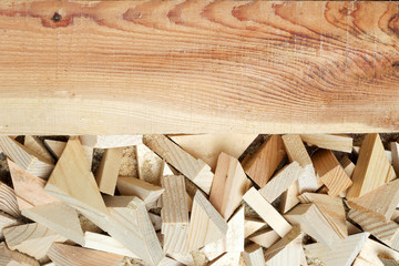 Carpenter tools on wooden table with sawdust.