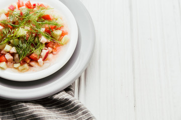 Salad of cucumber, tomato, dill and olive oil