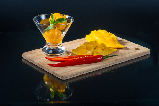 Ice cream dessert with mango and chilli