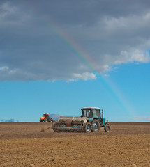 Fototapeta premium Tractors in the field