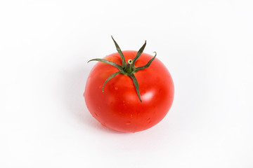 Red tomato isolated on white background