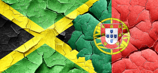 Jamaica flag with Portugal flag on a grunge cracked wall