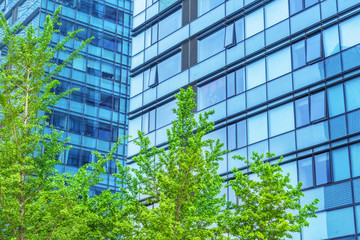 modern office building with green trees