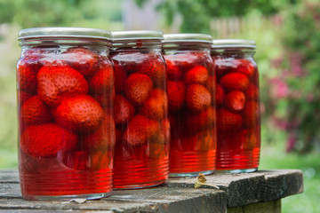Fototapeta na wymiar canned strawberries on the table