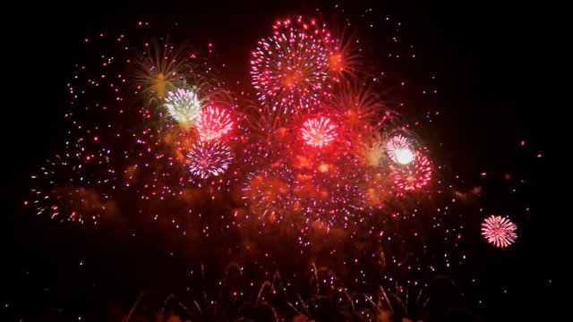 Colourful fireworks exploding high in the air. FullHD 1080p.